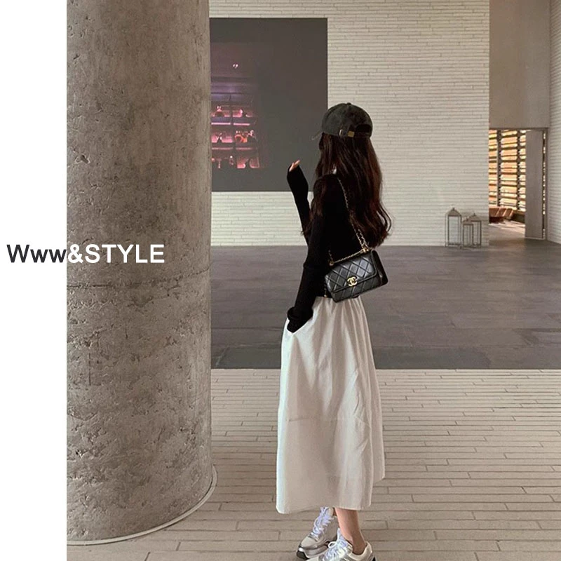 白色半身裙女夏季高级感法式a字半裙梨形身材松紧腰显瘦大摆伞裙