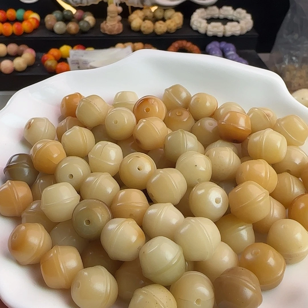 菩提根/象牙果手串瑕疵蜜罐100颗处理