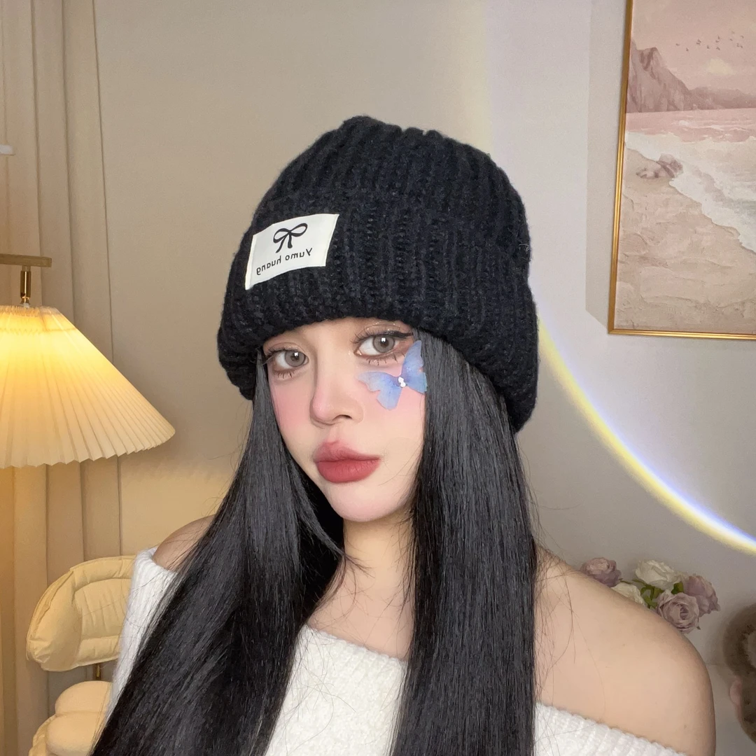 粉色蝴蝶结针织帽女秋冬保暖护耳简约百搭潮流显脸小毛线加厚冷帽