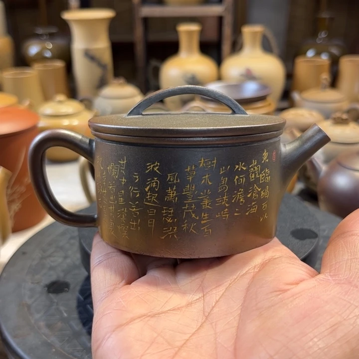 建水紫陶满刻汉瓦壶