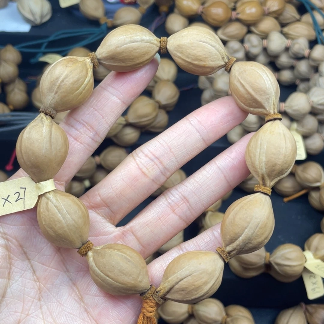 001橄榄核三花18*27