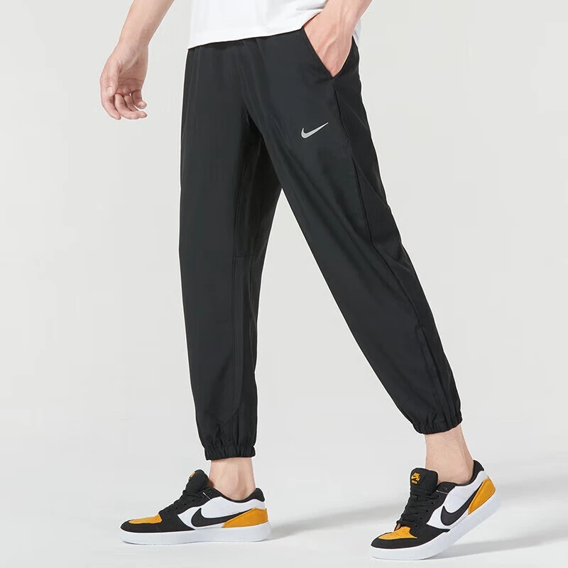 NIKE/耐克男士裤春夏季新款透气跑步运动裤束脚休闲九分梭织长裤