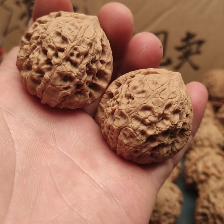 大叶紫檀（黑酸枝木类）大团圆手把件