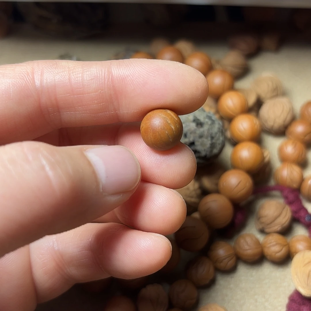 桃核吊坠R****n秦岭龙文光洙10加40颗