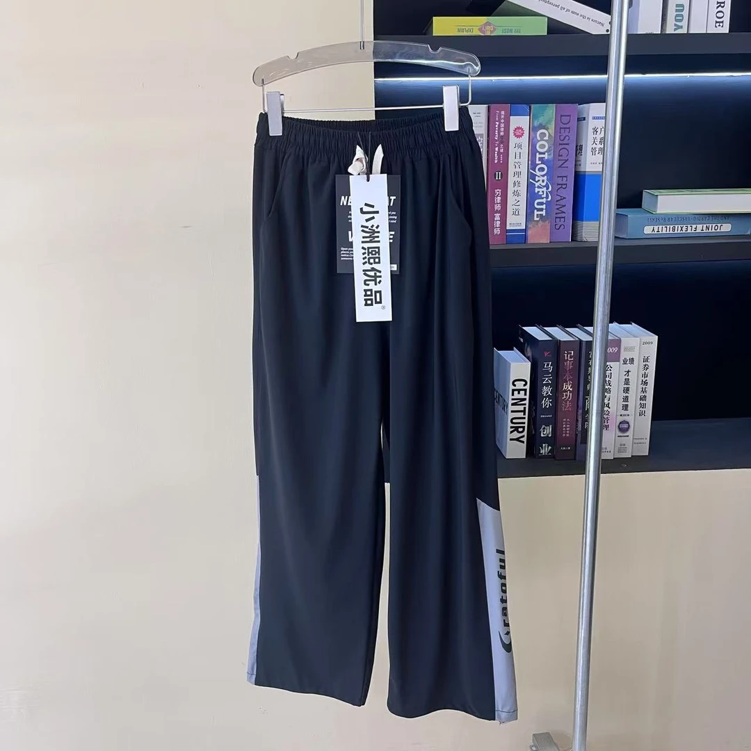 A27黑色青少年加肥时尚速干裤脚两用休闲裤