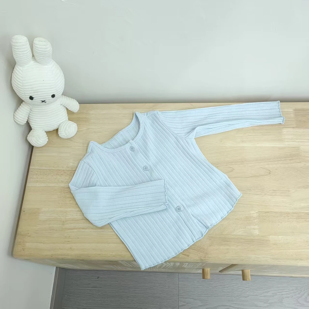 新款米朵茜净面坑条开衫9050