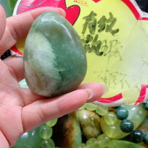 未镶嵌蛇纹石玉手把件