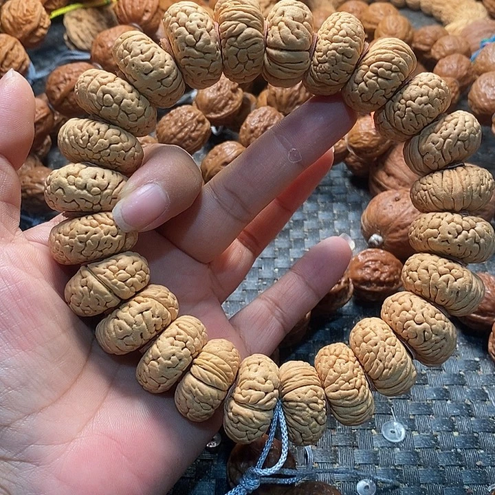 时***你文玩核桃手串桃核夹板