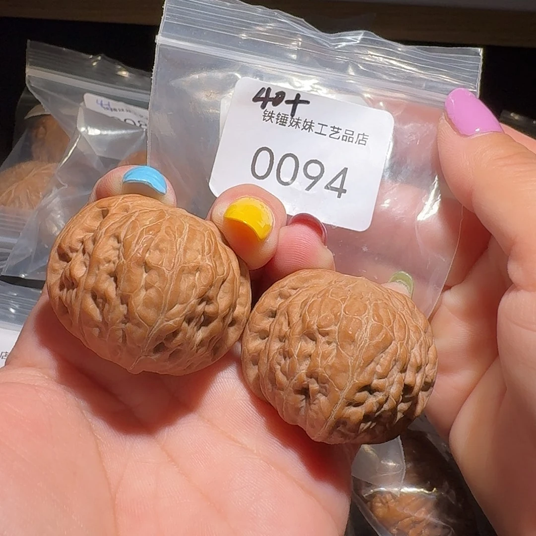 蔡***战文玩核桃把件铁锤40➕