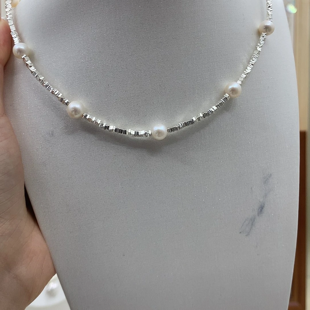 淡水珍珠银S925镶嵌耳饰