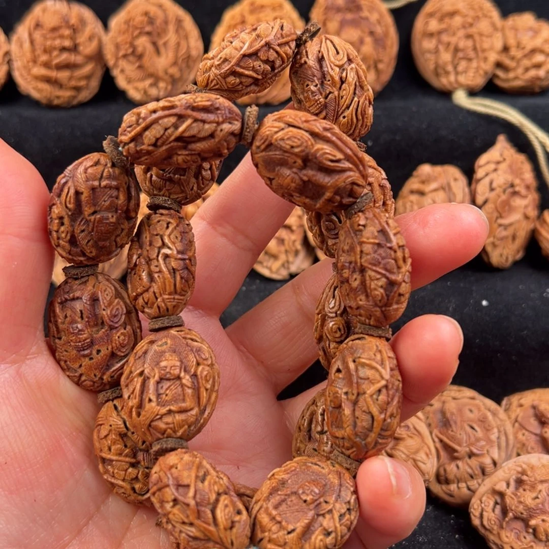 吊坠桃核雕刻雕刻