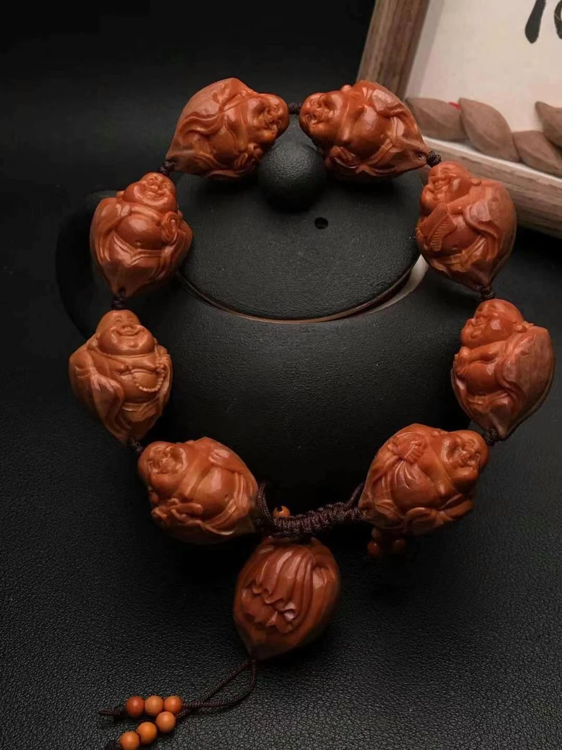 【包衣弥勒】2.1*2.7老纯刀铲留刀痕铁核精品橄榄核雕小籽文玩