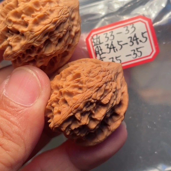 隆***回桃核把件野生千年鸡