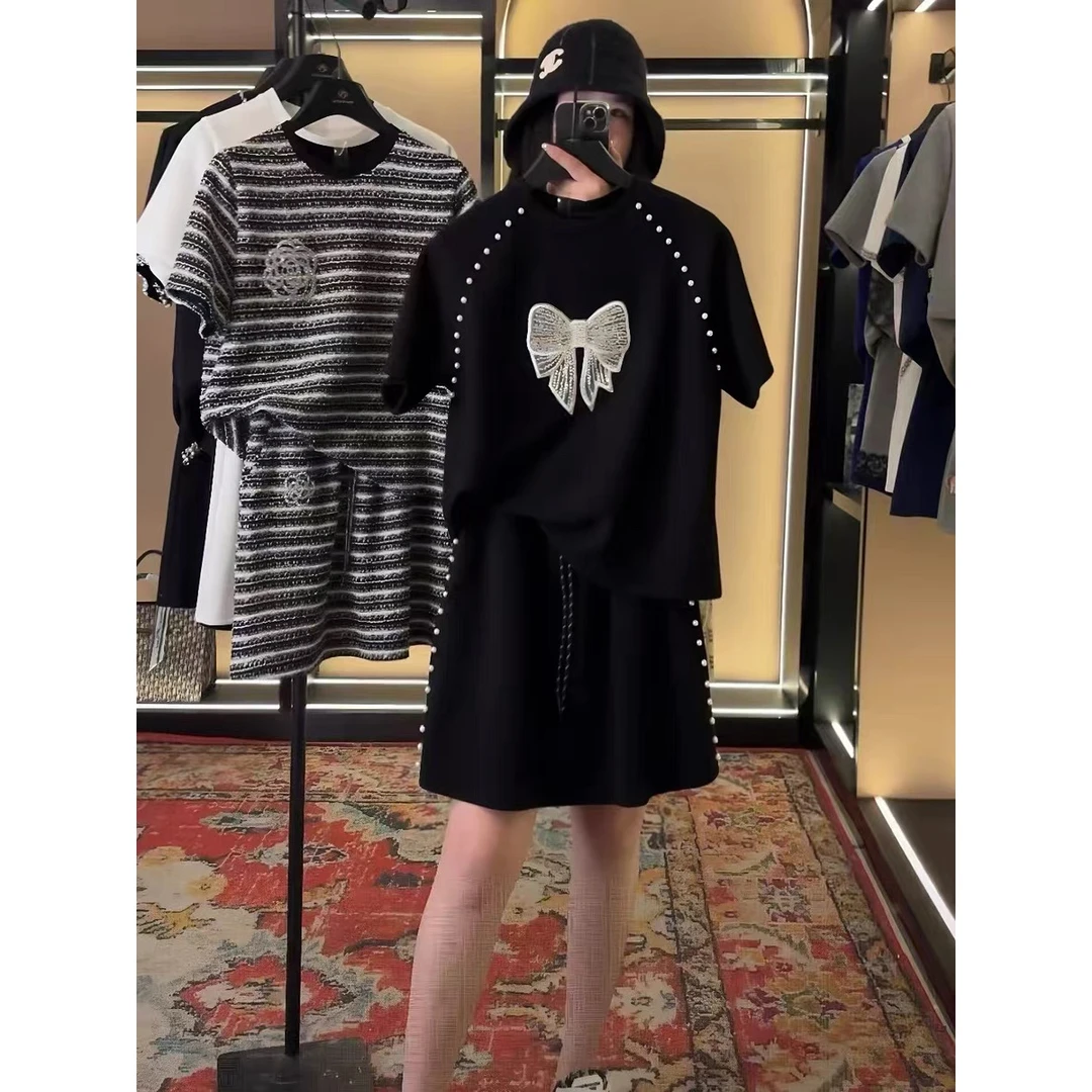 2025夏季新款时尚套装女设计感小众蝴蝶结短袖高腰半身裤裙两件套