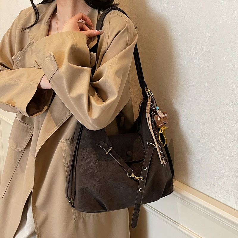 红色包包韩版大容量百搭通勤包2025秋冬新款多功能背包简约斜挎