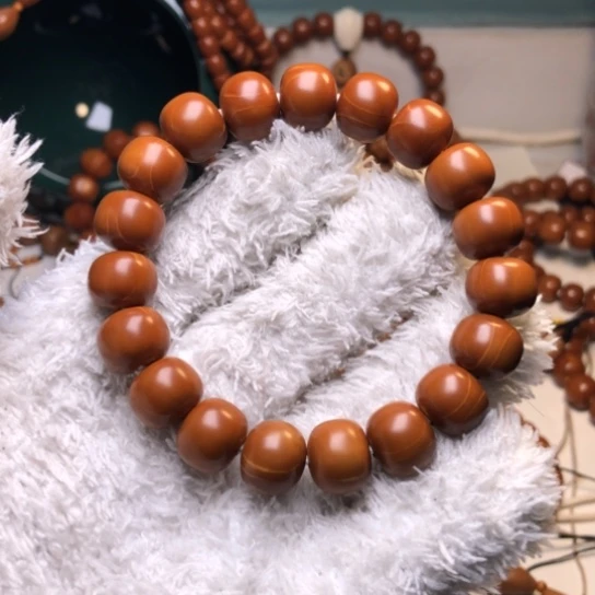 橄榄核吊坠沈****业1.3+”老型手串