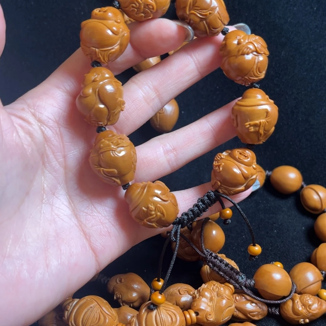 马***克橄榄核吊坠米勒串