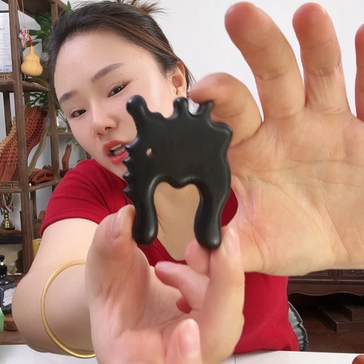 紫光檀紫光檀龙手瑕疵