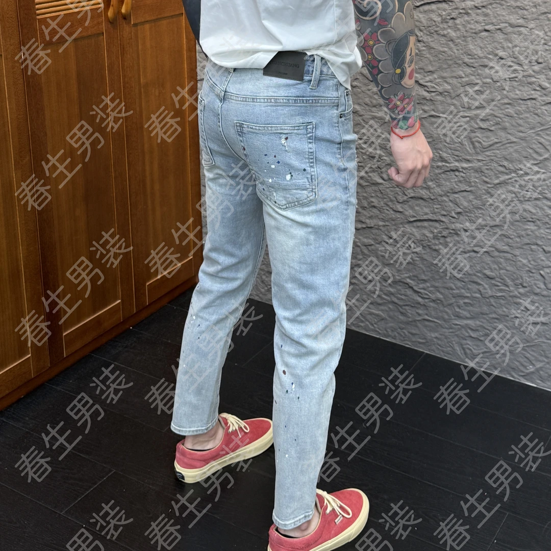 2025春季新款时尚休闲百搭假破洞泼墨男士小脚牛仔裤6135