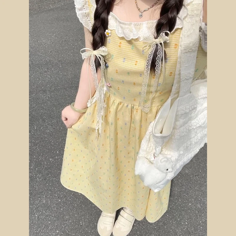 0270夏季云南旅游穿搭黄色格子飞飞袖连衣裙子女2025新款法式长裙