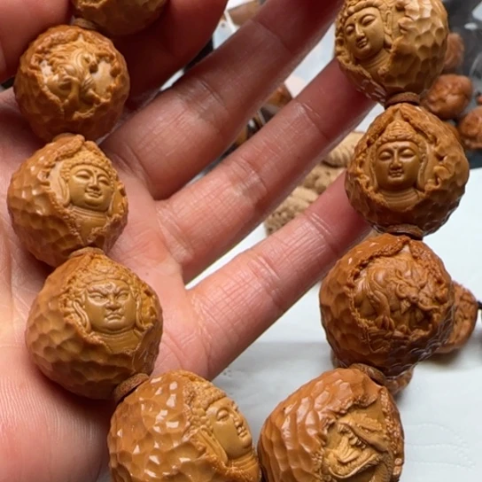 吊坠橄榄核橄榄雕的是