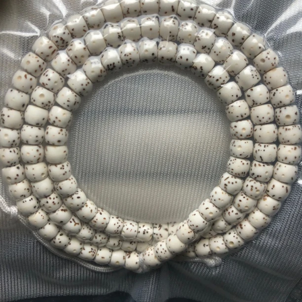 1031海南星月菩提原脂白6×5直切带月留白个别偏月多圈120颗