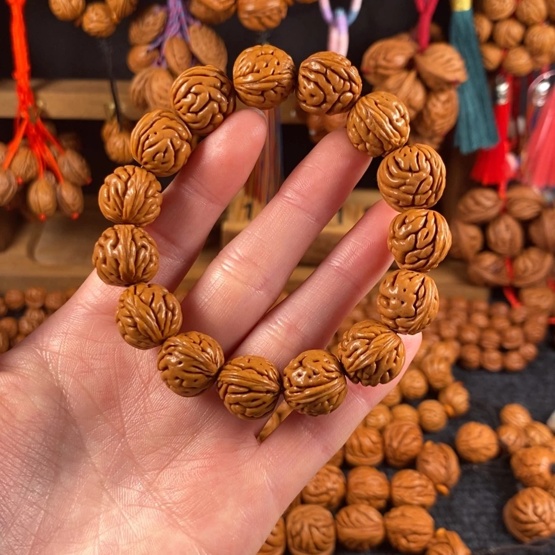 吊坠桃核9链接桃枭手串