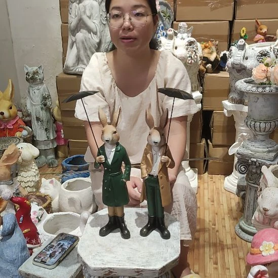 合成树脂树脂打伞兔一对