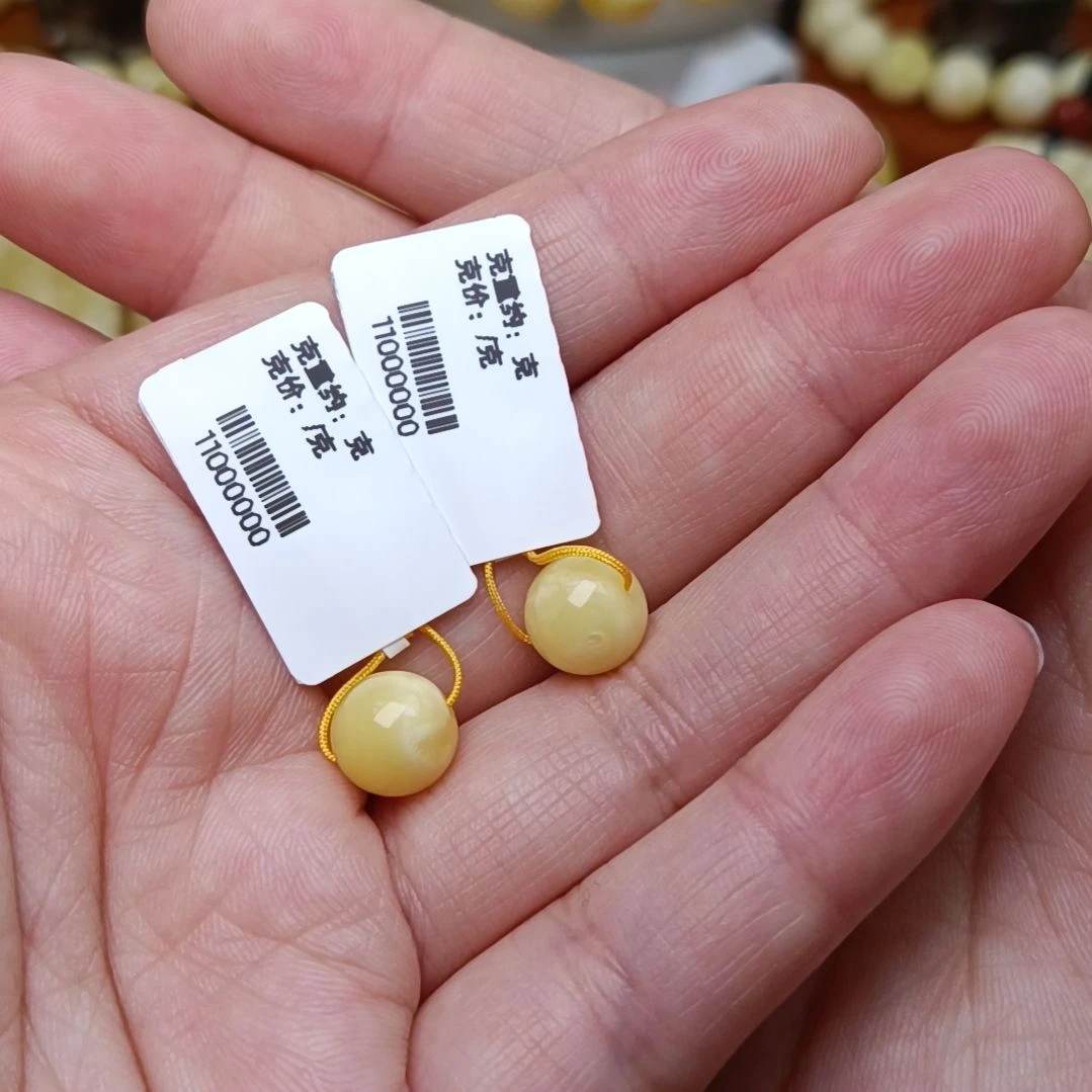蜜蜡裸石未镶嵌杨***、8对珠