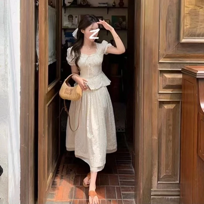 刺绣花边半身裙女2025年春夏新款半身长裙温柔气质显瘦2