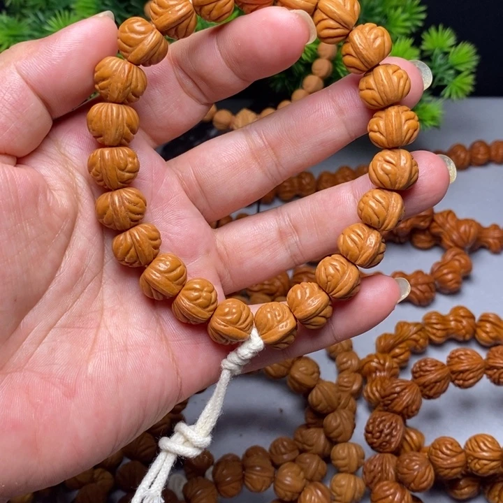 桃核手串小凤羽手持