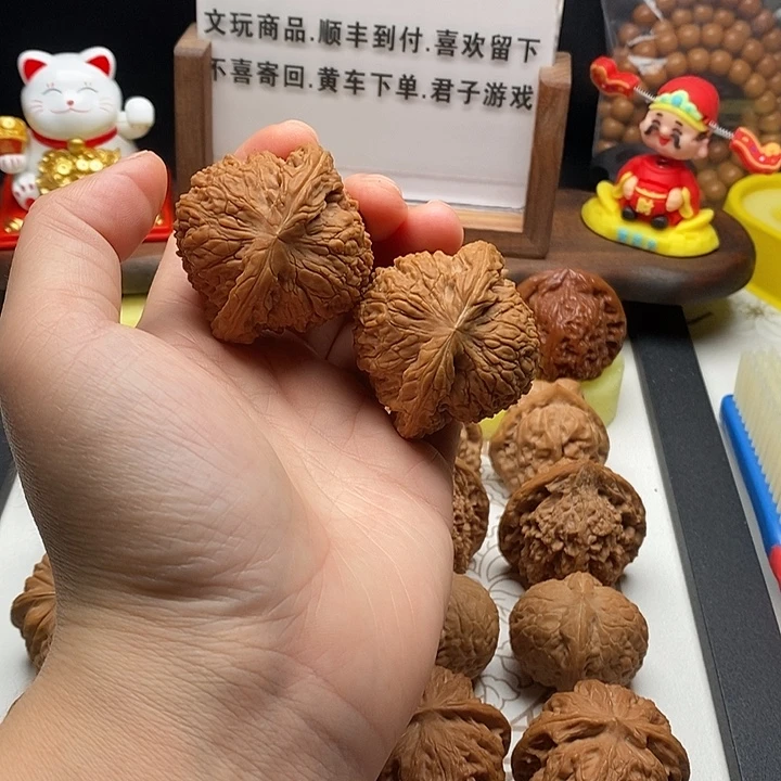 桃核吊坠南疆石粗棱全品