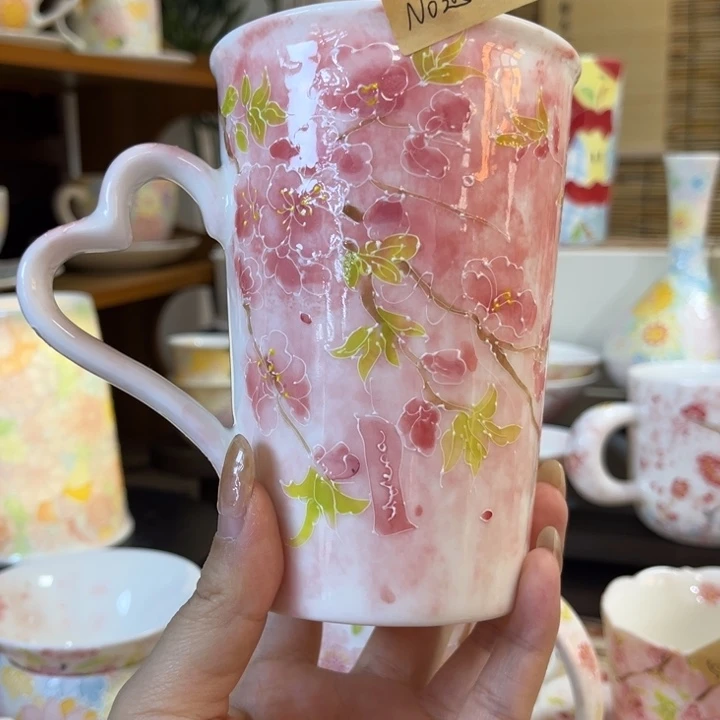 手柄款陶瓷桃花马克杯