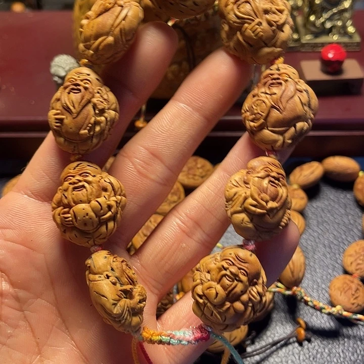 大桃核雕刻寿星手串