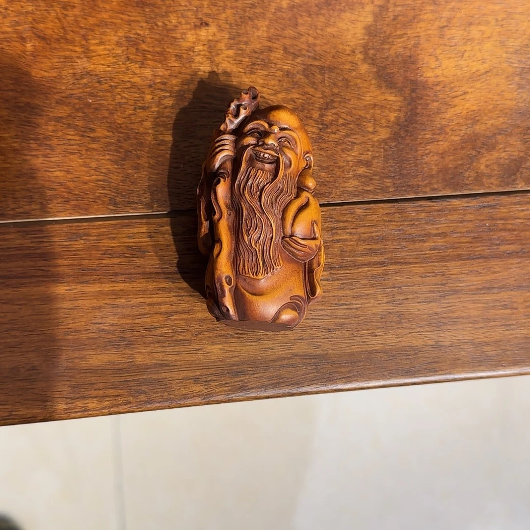 莊****寿星一个黄杨木一个