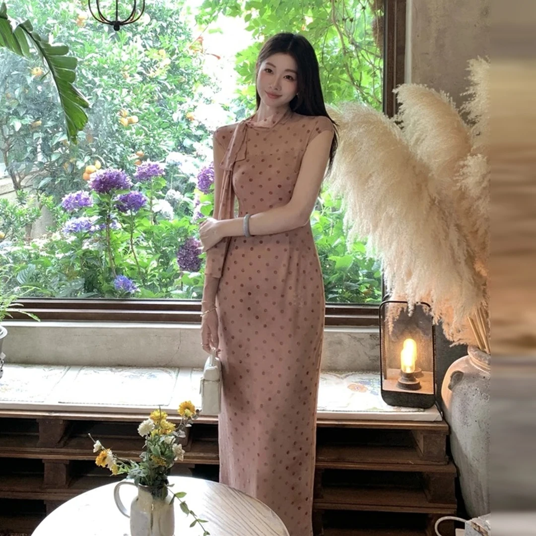 法式温柔粉色波点连衣裙子女夏季2025新款小个子掐腰气质包臀长裙