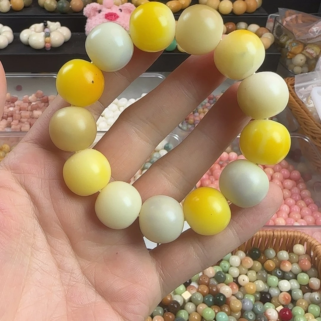 菩提根/象牙果吊坠瑕疵黄苹果手串一条