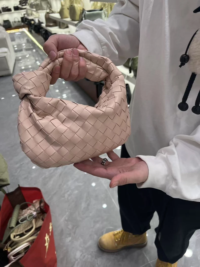 YUSHA/高档杏仁粉羊皮编织绳结小号手拎包-8366