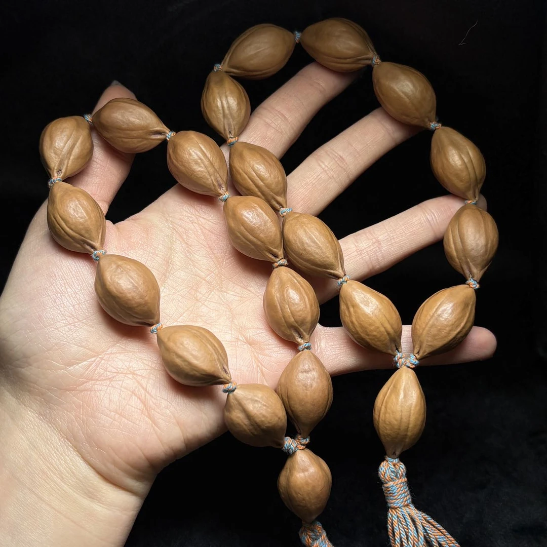 【曹掌柜精选】22 G66386-橄榄核手持-多样性发一件