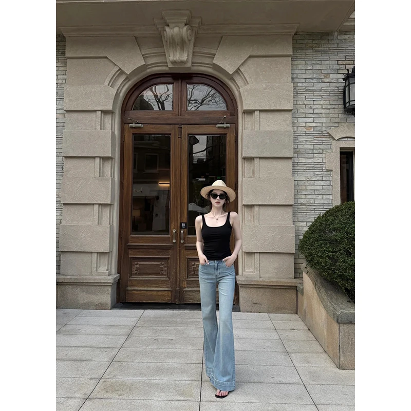 极简风御姐时髦气质设计款黑色上衣吊带百搭显瘦牛仔喇叭长裤套装