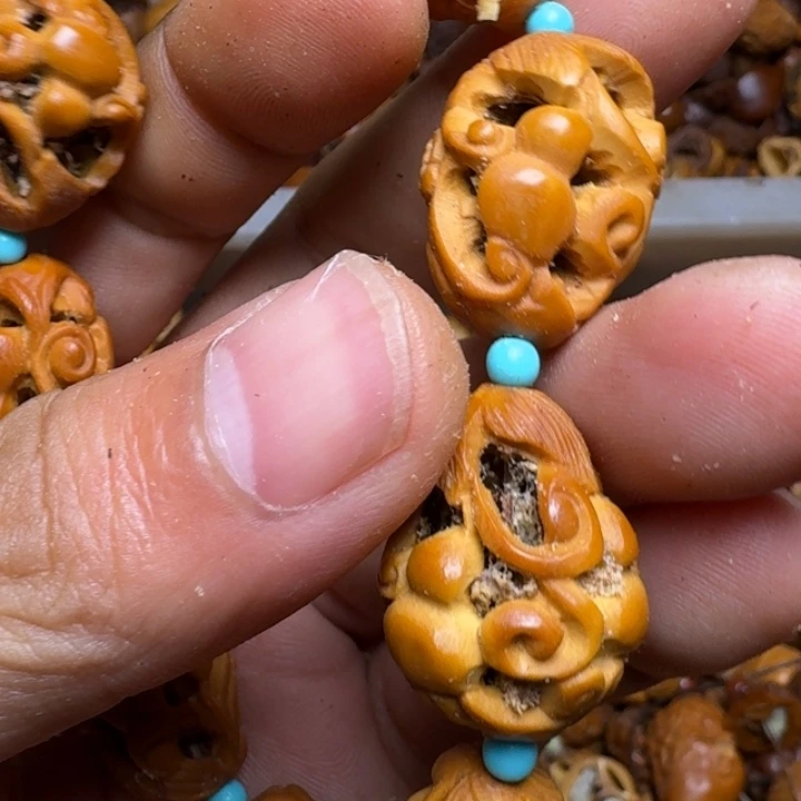 橄榄核把件你的电话