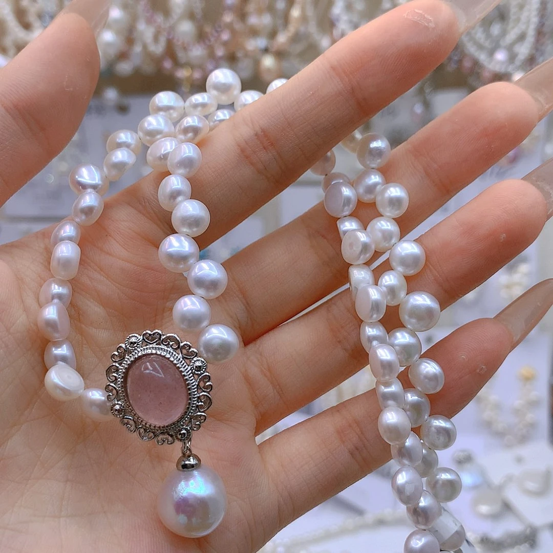 银S925镶嵌淡水珍珠发饰。*