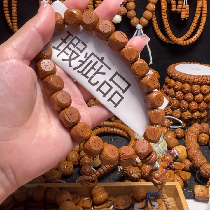 桃核手串六方手持瑕疵