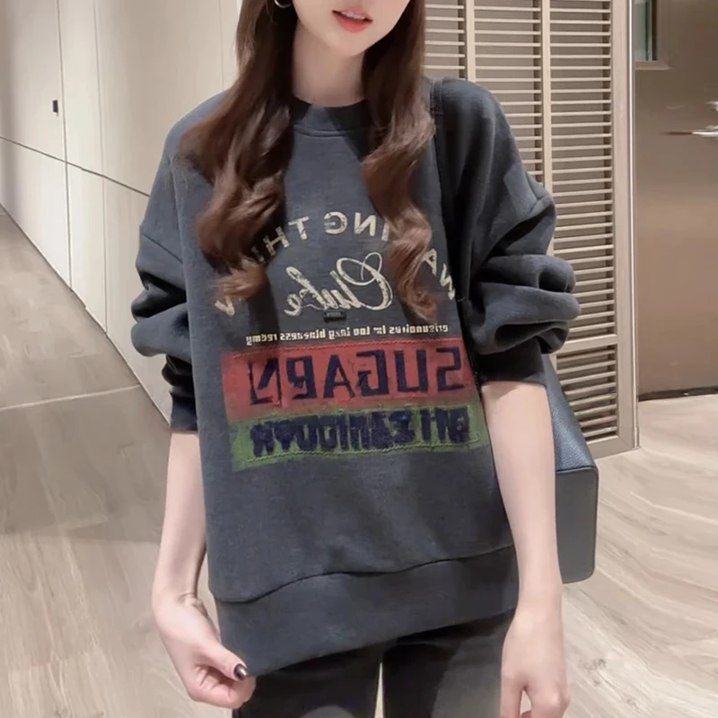 2025秋季新款时尚百搭设计感显瘦衣服女韩系圆领套头拼色长袖卫衣