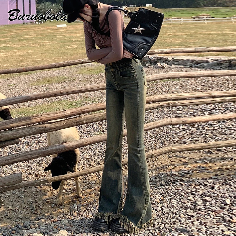 复古蓝加绒毛边喇叭牛仔裤女2023年冬季高腰流苏设计感薄绒马帅气
