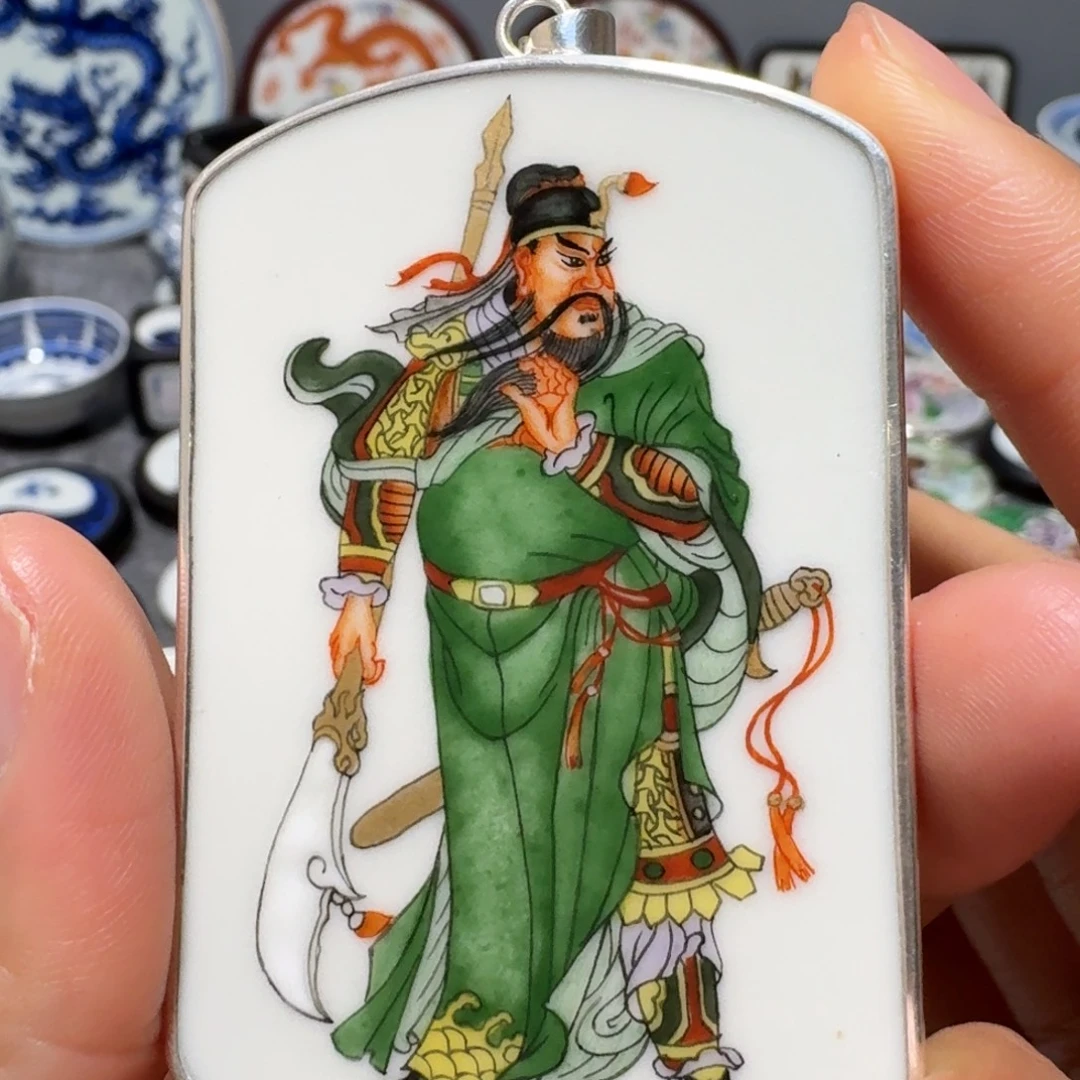 嗯***哼瓷片精品挂件一个