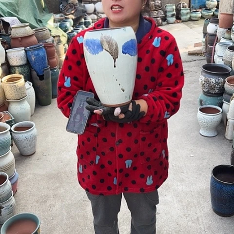 口15高27瑕疵盆子。