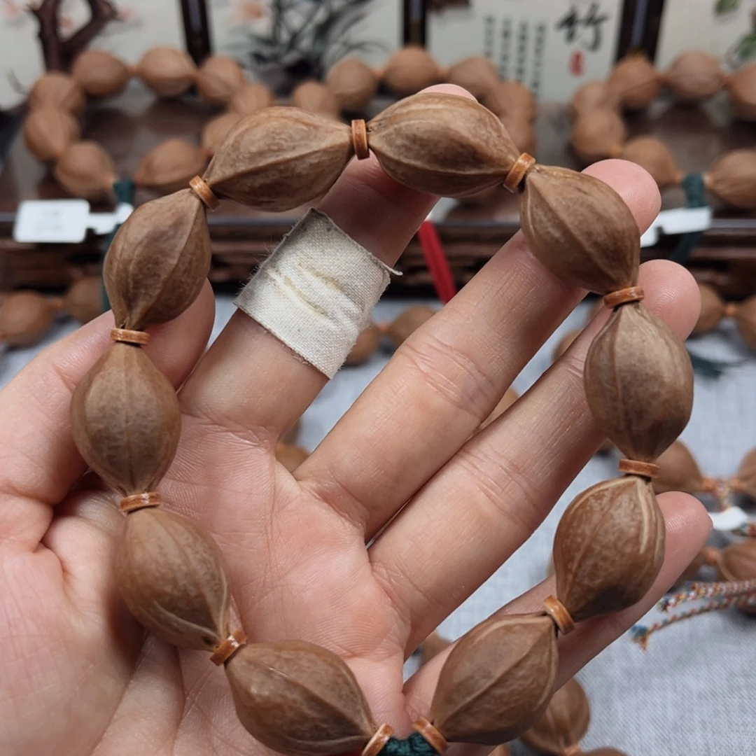 紫***盂橄榄核吊坠梅林铁核16.25