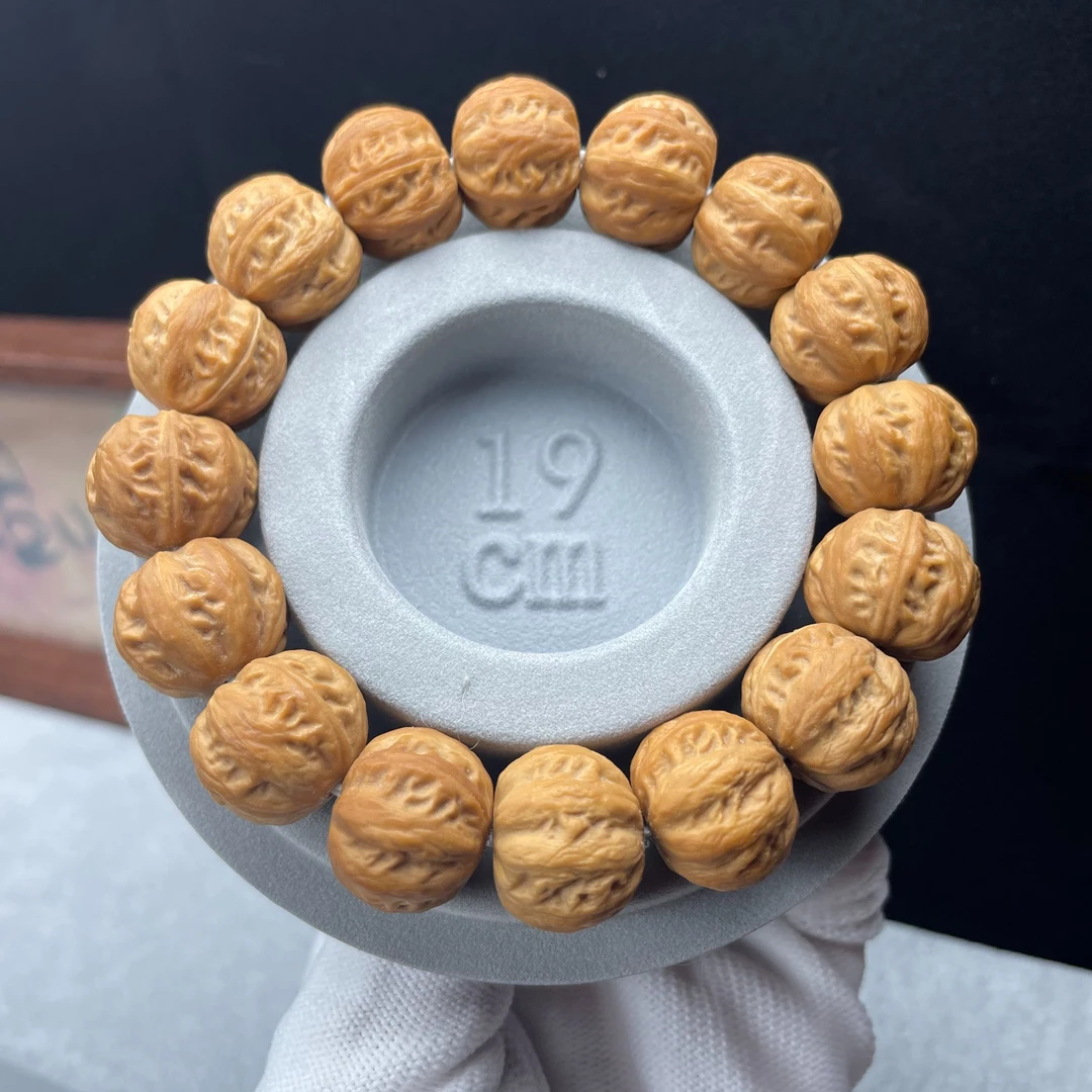 原色京八棱.猴头雕刻原色文玩手串