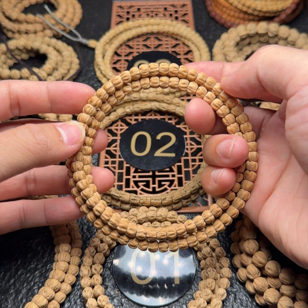 柏香籽/百香籽吊坠L****、